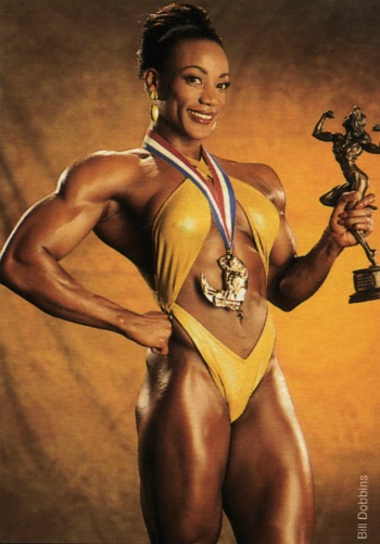 Lenda Murray with Ms. Olympia trophy